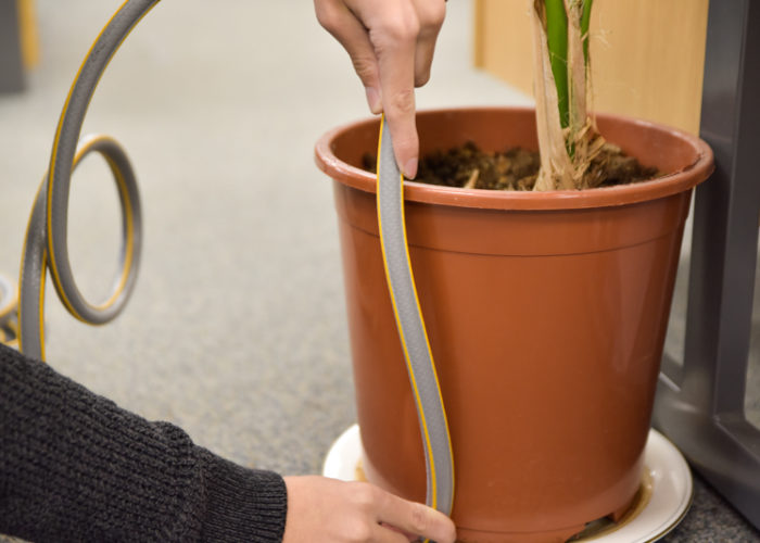 An in pot watering system